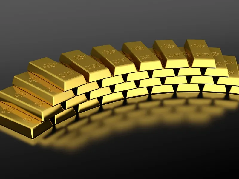 lingotes-de-oro-sobre-fondo-de-graficos-bursatiles-en-alza El precio del oro alcanza un máximo histórico de 4.722 dólares ante el temor a una guerra comercial transatlántica por Groenlandia y los aranceles de Trump
